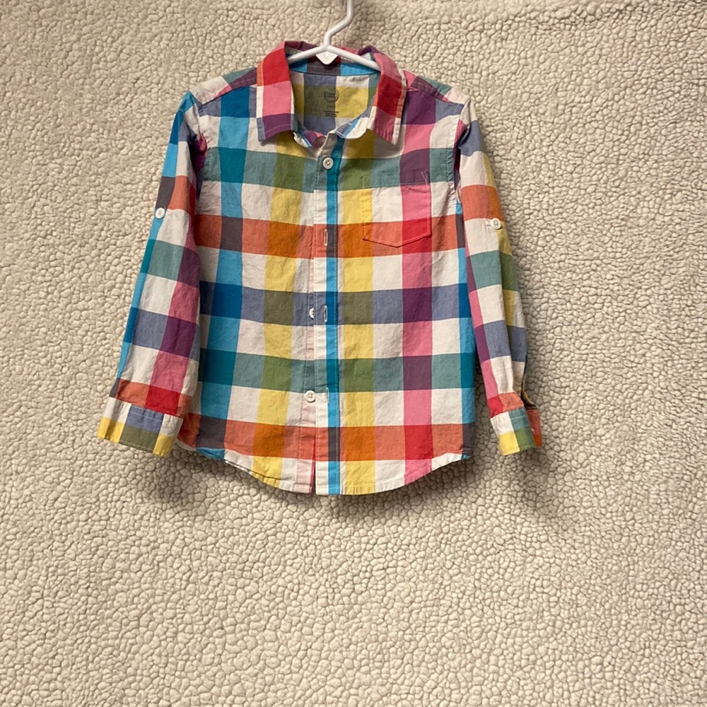 Very colorful boy’s button up shirt.